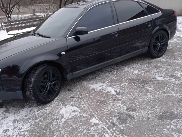 Черный Ауди А6, объемом двигателя 1.8 л и пробегом 380 тыс. км за 5500 $, фото 1 на Automoto.ua