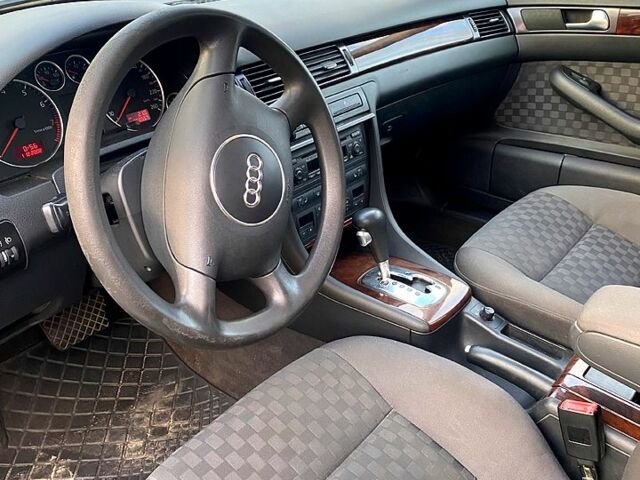 Чорний Ауді А6, об'ємом двигуна 2.4 л та пробігом 350 тис. км за 4200 $, фото 1 на Automoto.ua