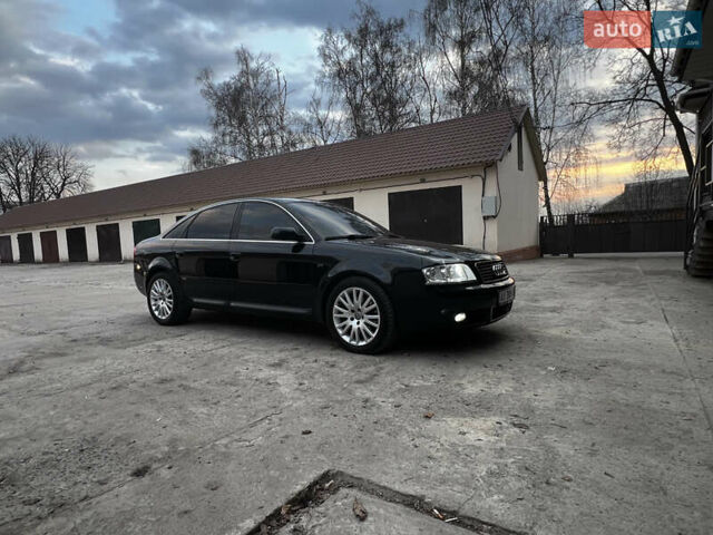 Черный Ауди А6, объемом двигателя 2.5 л и пробегом 175 тыс. км за 6500 $, фото 1 на Automoto.ua