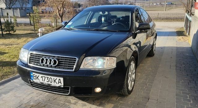 Черный Ауди А6, объемом двигателя 2.5 л и пробегом 286 тыс. км за 4700 $, фото 1 на Automoto.ua