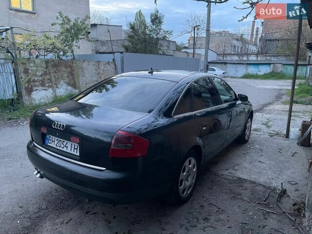 Черный Ауди А6, объемом двигателя 2.5 л и пробегом 342 тыс. км за 4500 $, фото 1 на Automoto.ua