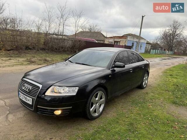 Чорний Ауді А6, об'ємом двигуна 2.4 л та пробігом 252 тис. км за 5300 $, фото 1 на Automoto.ua