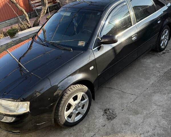 Чорний Ауді А6, об'ємом двигуна 2.5 л та пробігом 313 тис. км за 6100 $, фото 1 на Automoto.ua