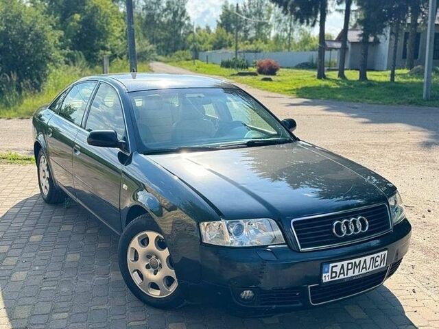 Черный Ауди А6, объемом двигателя 2.5 л и пробегом 300 тыс. км за 3700 $, фото 1 на Automoto.ua