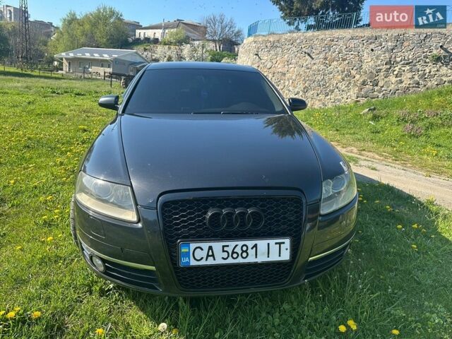 Черный Ауди А6, объемом двигателя 2.97 л и пробегом 310 тыс. км за 6400 $, фото 1 на Automoto.ua