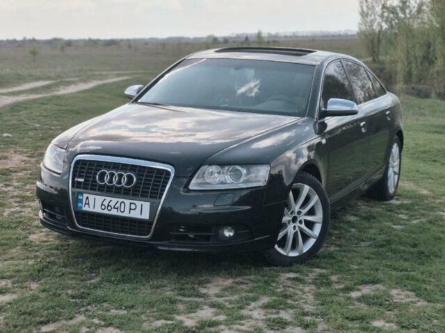 Черный Ауди А6, объемом двигателя 3.2 л и пробегом 292 тыс. км за 7500 $, фото 1 на Automoto.ua