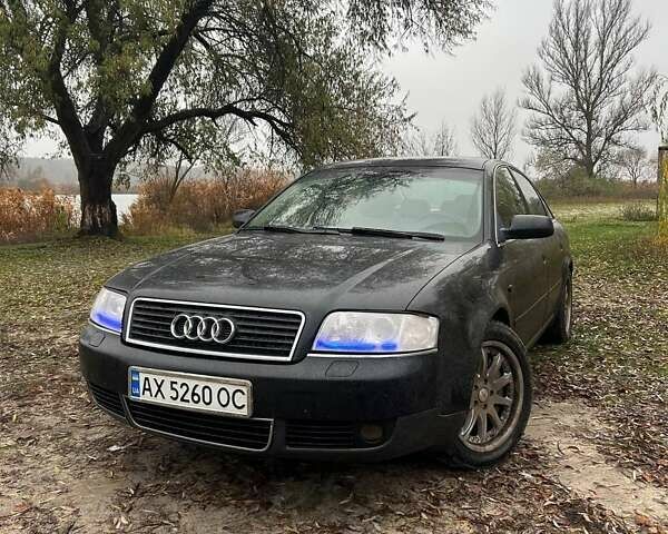 Черный Ауди А6, объемом двигателя 2.5 л и пробегом 278 тыс. км за 6000 $, фото 1 на Automoto.ua