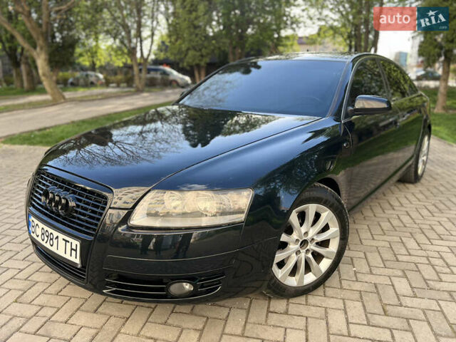 Черный Ауди А6, объемом двигателя 2.98 л и пробегом 375 тыс. км за 7450 $, фото 1 на Automoto.ua