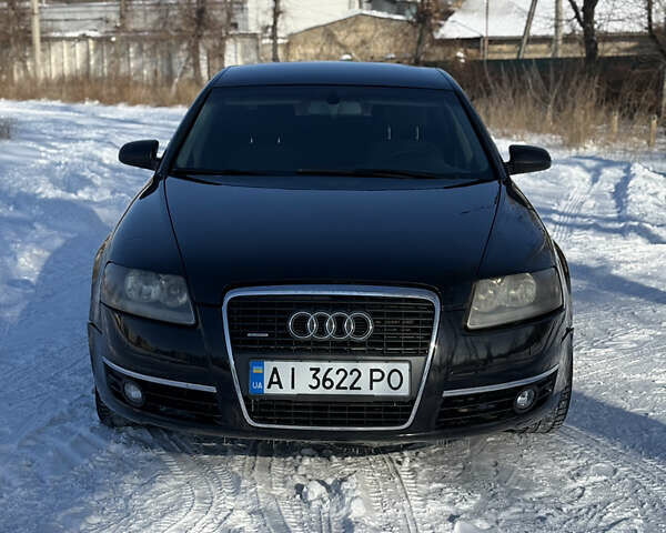 Черный Ауди А6, объемом двигателя 2.4 л и пробегом 300 тыс. км за 5000 $, фото 1 на Automoto.ua