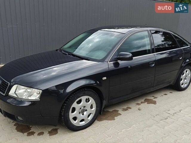 Черный Ауди А6, объемом двигателя 2.5 л и пробегом 241 тыс. км за 4900 $, фото 1 на Automoto.ua