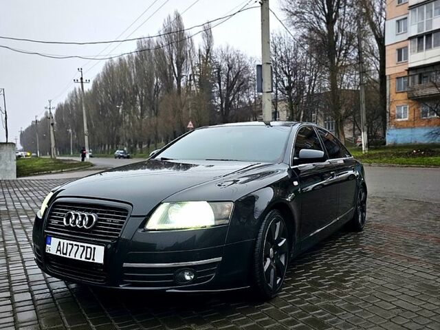 Черный Ауди А6, объемом двигателя 3.2 л и пробегом 330 тыс. км за 7000 $, фото 1 на Automoto.ua