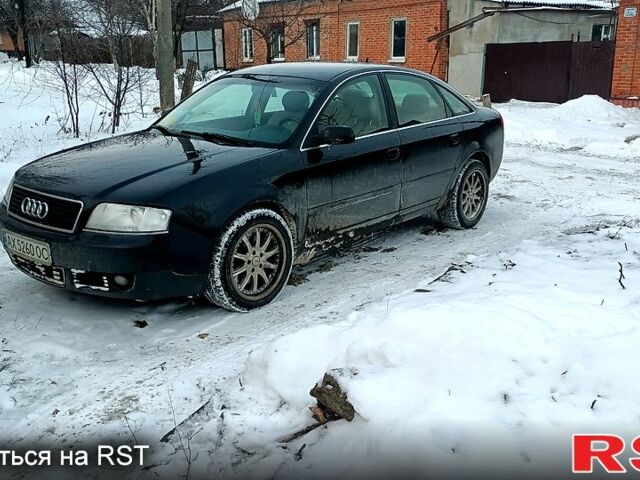 Черный Ауди А6, объемом двигателя 2.5 л и пробегом 250 тыс. км за 5350 $, фото 1 на Automoto.ua