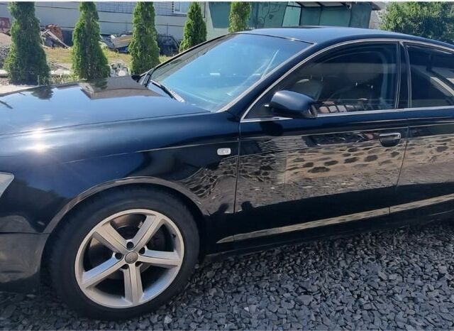 Черный Ауди А6, объемом двигателя 4.2 л и пробегом 385 тыс. км за 4700 $, фото 1 на Automoto.ua
