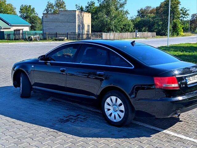 Черный Ауди А6, объемом двигателя 2.4 л и пробегом 220 тыс. км за 5950 $, фото 1 на Automoto.ua