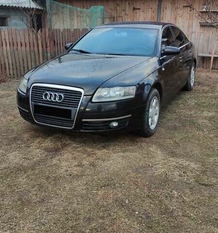 Черный Ауди А6, объемом двигателя 2 л и пробегом 360 тыс. км за 5500 $, фото 1 на Automoto.ua