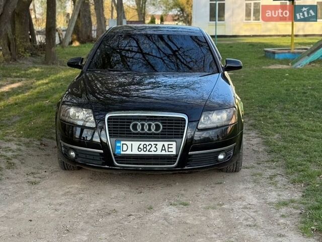 Черный Ауди А6, объемом двигателя 2.39 л и пробегом 296 тыс. км за 5850 $, фото 1 на Automoto.ua