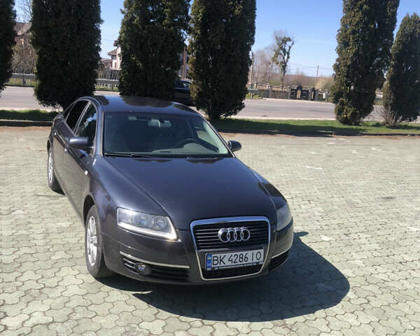 Черный Ауди А6, объемом двигателя 2.4 л и пробегом 230 тыс. км за 6400 $, фото 1 на Automoto.ua