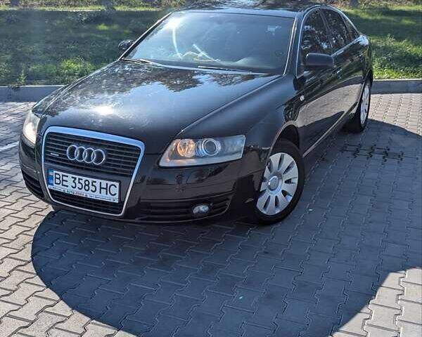 Черный Ауди А6, объемом двигателя 2.4 л и пробегом 220 тыс. км за 5700 $, фото 1 на Automoto.ua