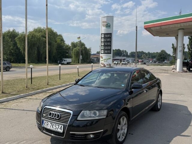 Черный Ауди А6, объемом двигателя 2 л и пробегом 400 тыс. км за 3700 $, фото 1 на Automoto.ua
