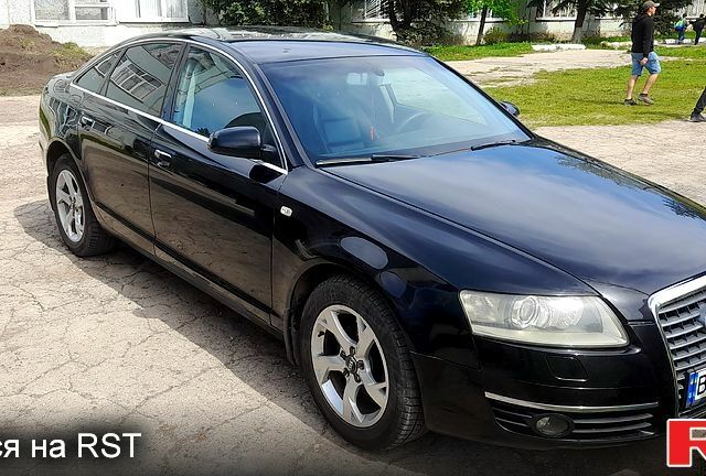 Черный Ауди А6, объемом двигателя 2.4 л и пробегом 300 тыс. км за 6300 $, фото 1 на Automoto.ua