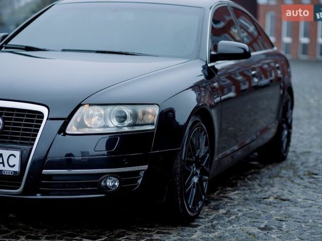Черный Ауди А6, объемом двигателя 3.2 л и пробегом 246 тыс. км за 8250 $, фото 1 на Automoto.ua
