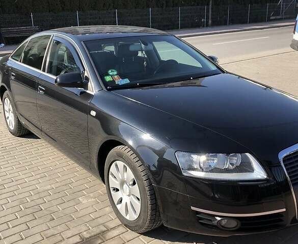 Черный Ауди А6, объемом двигателя 2 л и пробегом 352 тыс. км за 7067 $, фото 1 на Automoto.ua