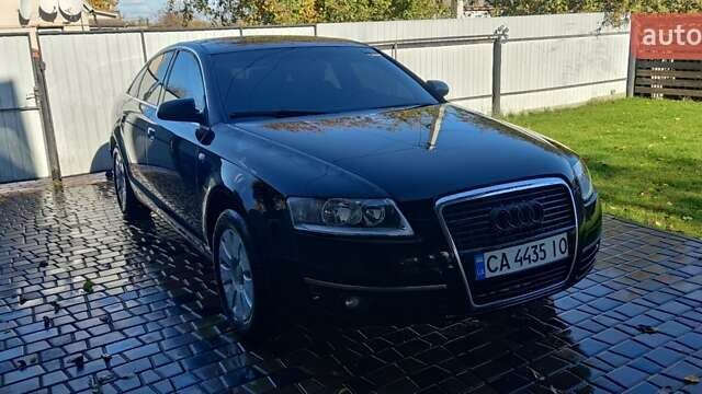 Чорний Ауді А6, об'ємом двигуна 1.98 л та пробігом 503 тис. км за 7500 $, фото 1 на Automoto.ua