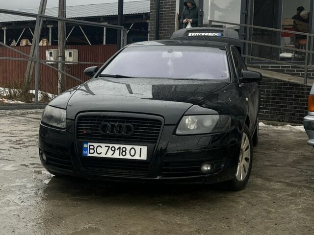 Черный Ауди А6, объемом двигателя 2 л и пробегом 414 тыс. км за 5500 $, фото 1 на Automoto.ua
