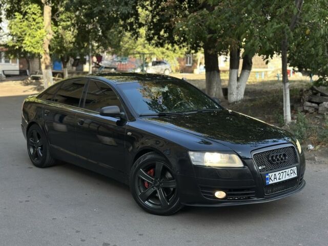 Черный Ауди А6, объемом двигателя 2 л и пробегом 300 тыс. км за 6500 $, фото 1 на Automoto.ua