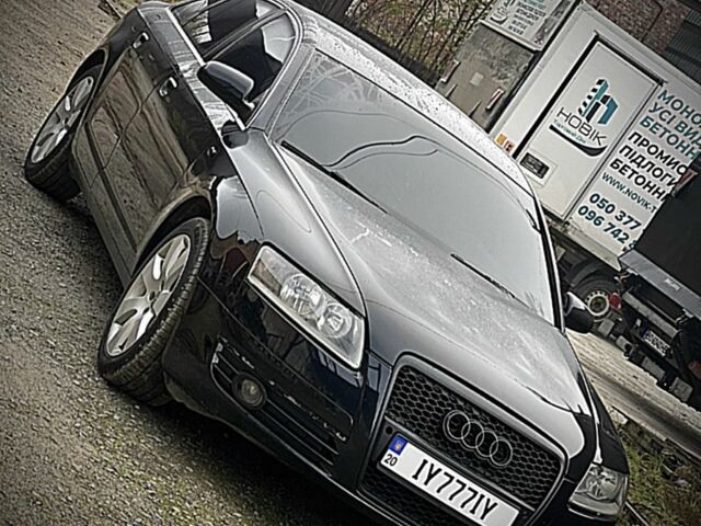 Черный Ауди А6, объемом двигателя 2 л и пробегом 253 тыс. км за 6999 $, фото 1 на Automoto.ua