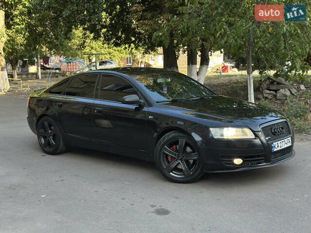 Черный Ауди А6, объемом двигателя 1.98 л и пробегом 299 тыс. км за 7000 $, фото 1 на Automoto.ua