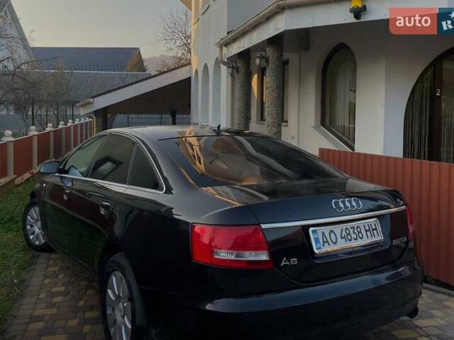 Чорний Ауді А6, об'ємом двигуна 1.98 л та пробігом 235 тис. км за 8500 $, фото 1 на Automoto.ua
