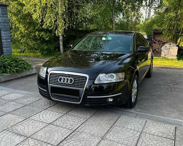 Черный Ауди А6, объемом двигателя 2.4 л и пробегом 172 тыс. км за 8300 $, фото 1 на Automoto.ua