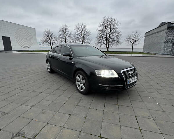 Черный Ауди А6, объемом двигателя 2.39 л и пробегом 262 тыс. км за 8600 $, фото 1 на Automoto.ua