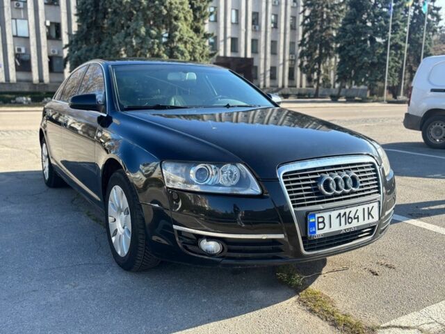 Черный Ауди А6, объемом двигателя 2.4 л и пробегом 252 тыс. км за 5600 $, фото 1 на Automoto.ua
