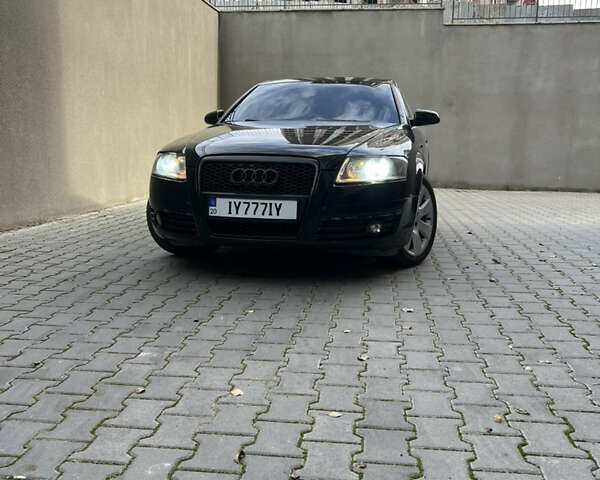 Черный Ауди А6, объемом двигателя 1.98 л и пробегом 253 тыс. км за 7200 $, фото 1 на Automoto.ua