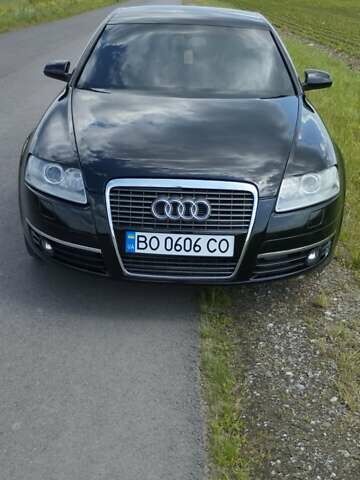 Черный Ауди А6, объемом двигателя 2 л и пробегом 317 тыс. км за 8000 $, фото 1 на Automoto.ua