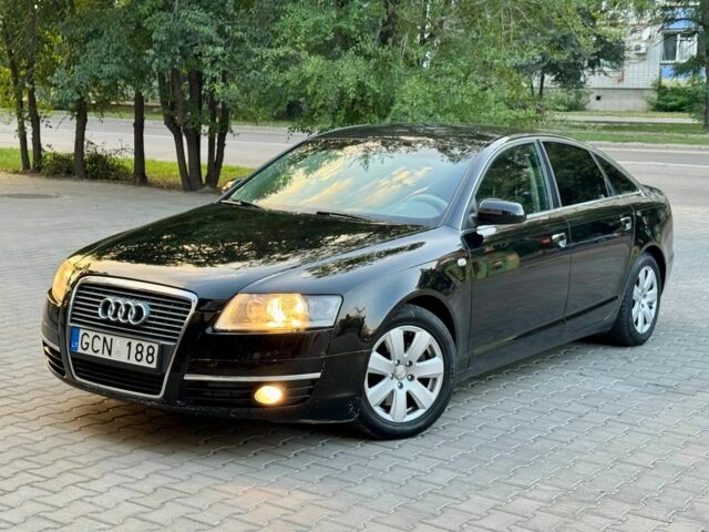 Черный Ауди А6, объемом двигателя 7 л и пробегом 239 тыс. км за 4003 $, фото 1 на Automoto.ua