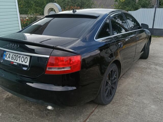 Чорний Ауді А6, об'ємом двигуна 2 л та пробігом 300 тис. км за 7728 $, фото 1 на Automoto.ua