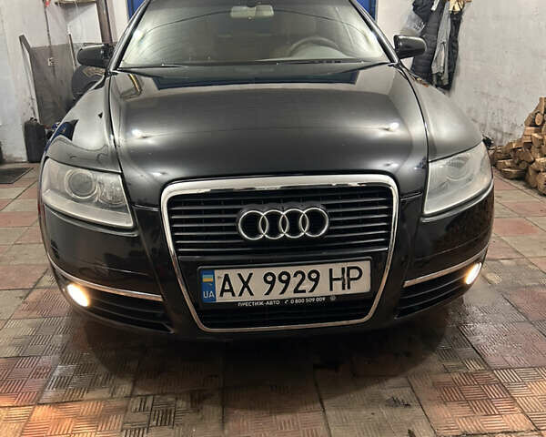 Черный Ауди А6, объемом двигателя 2.4 л и пробегом 218 тыс. км за 6399 $, фото 1 на Automoto.ua