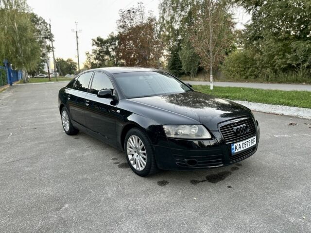 Черный Ауди А6, объемом двигателя 2 л и пробегом 285 тыс. км за 6022 $, фото 1 на Automoto.ua