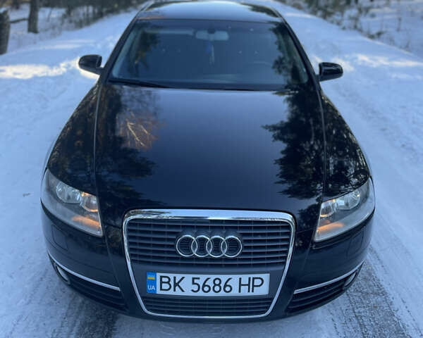 Чорний Ауді А6, об'ємом двигуна 2 л та пробігом 248 тис. км за 7100 $, фото 1 на Automoto.ua