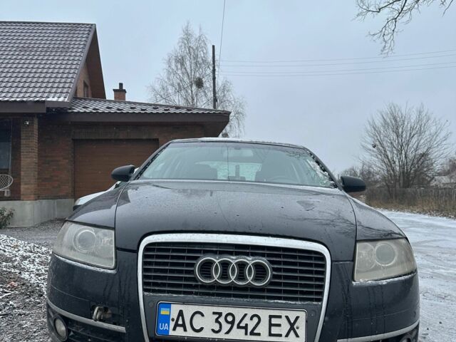 Черный Ауди А6, объемом двигателя 2 л и пробегом 397 тыс. км за 5800 $, фото 1 на Automoto.ua