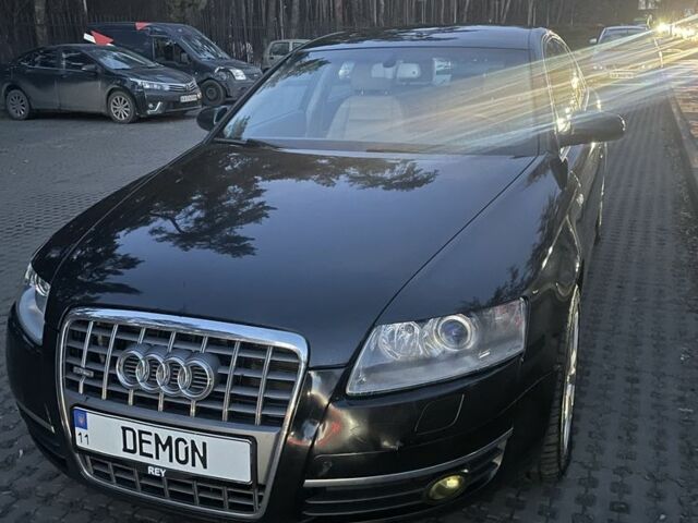 Черный Ауди А6, объемом двигателя 2.4 л и пробегом 275 тыс. км за 7000 $, фото 1 на Automoto.ua