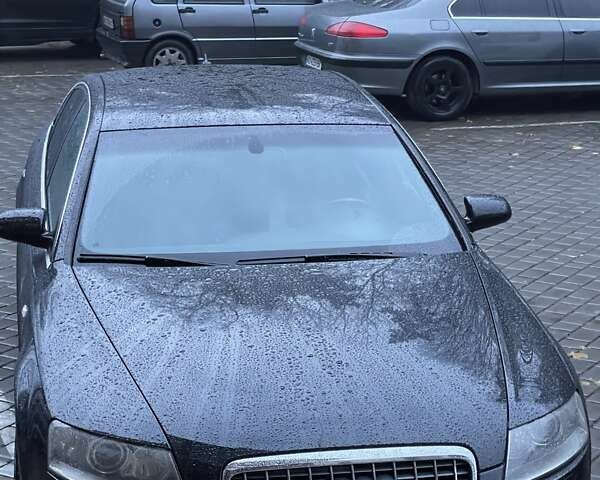 Черный Ауди А6, объемом двигателя 2.7 л и пробегом 280 тыс. км за 10500 $, фото 1 на Automoto.ua