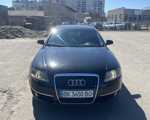 Черный Ауди А6, объемом двигателя 2.4 л и пробегом 329 тыс. км за 7700 $, фото 1 на Automoto.ua