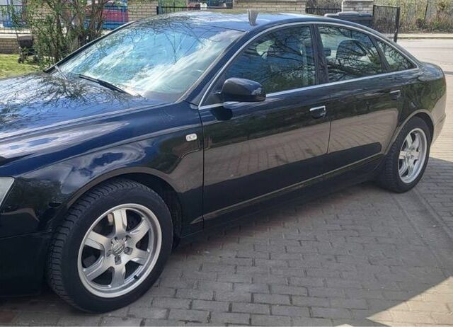 Черный Ауди А6, объемом двигателя 2 л и пробегом 220 тыс. км за 3500 $, фото 1 на Automoto.ua