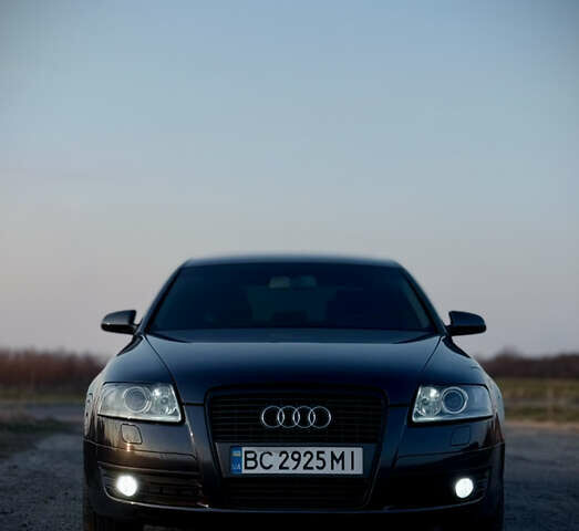 Черный Ауди А6, объемом двигателя 2 л и пробегом 319 тыс. км за 6500 $, фото 1 на Automoto.ua