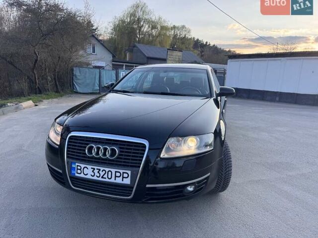 Черный Ауди А6, объемом двигателя 1.98 л и пробегом 243 тыс. км за 6300 $, фото 1 на Automoto.ua