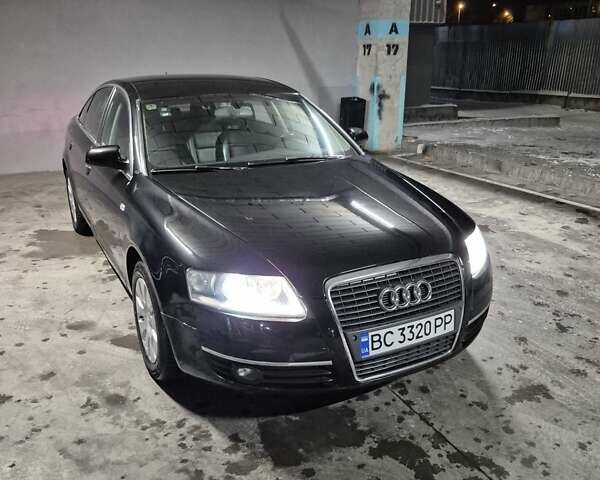 Чорний Ауді А6, об'ємом двигуна 1.98 л та пробігом 243 тис. км за 7500 $, фото 1 на Automoto.ua